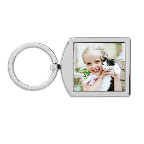 photo keychain with picture of little girl holding a cat